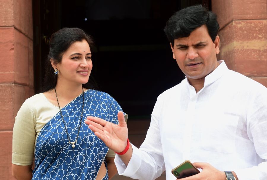 New Delhi: MP Navneet Rana with husband Ravi Rana (R) during the Monsoon Session of Parliament, in New Delhi, Friday, July 23, 2021. (PTI Photo/Kamal Kishore)